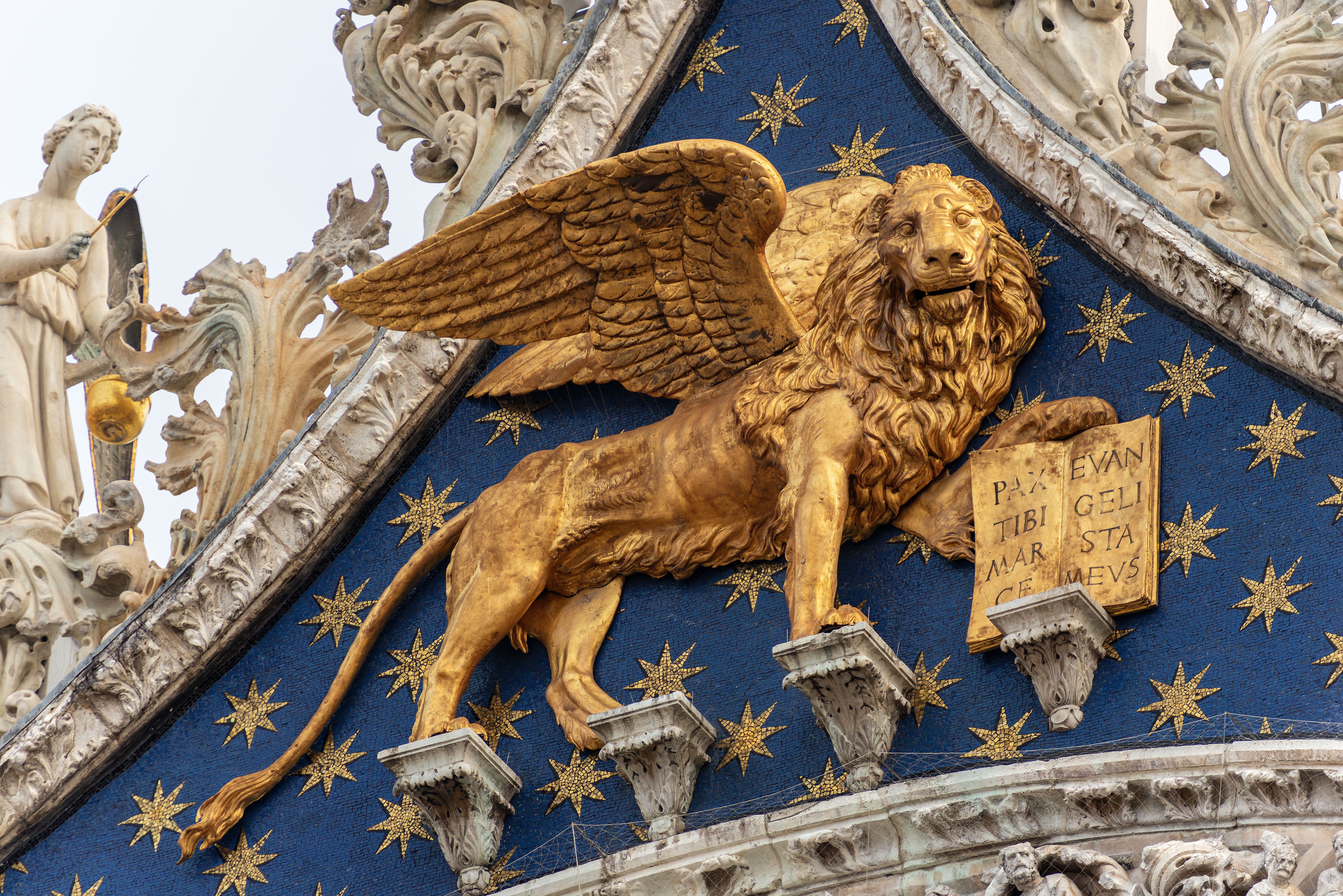 Venice, close up of the golden winged lion of St Mark, symbol of the evangelist and the Venetian Republic.